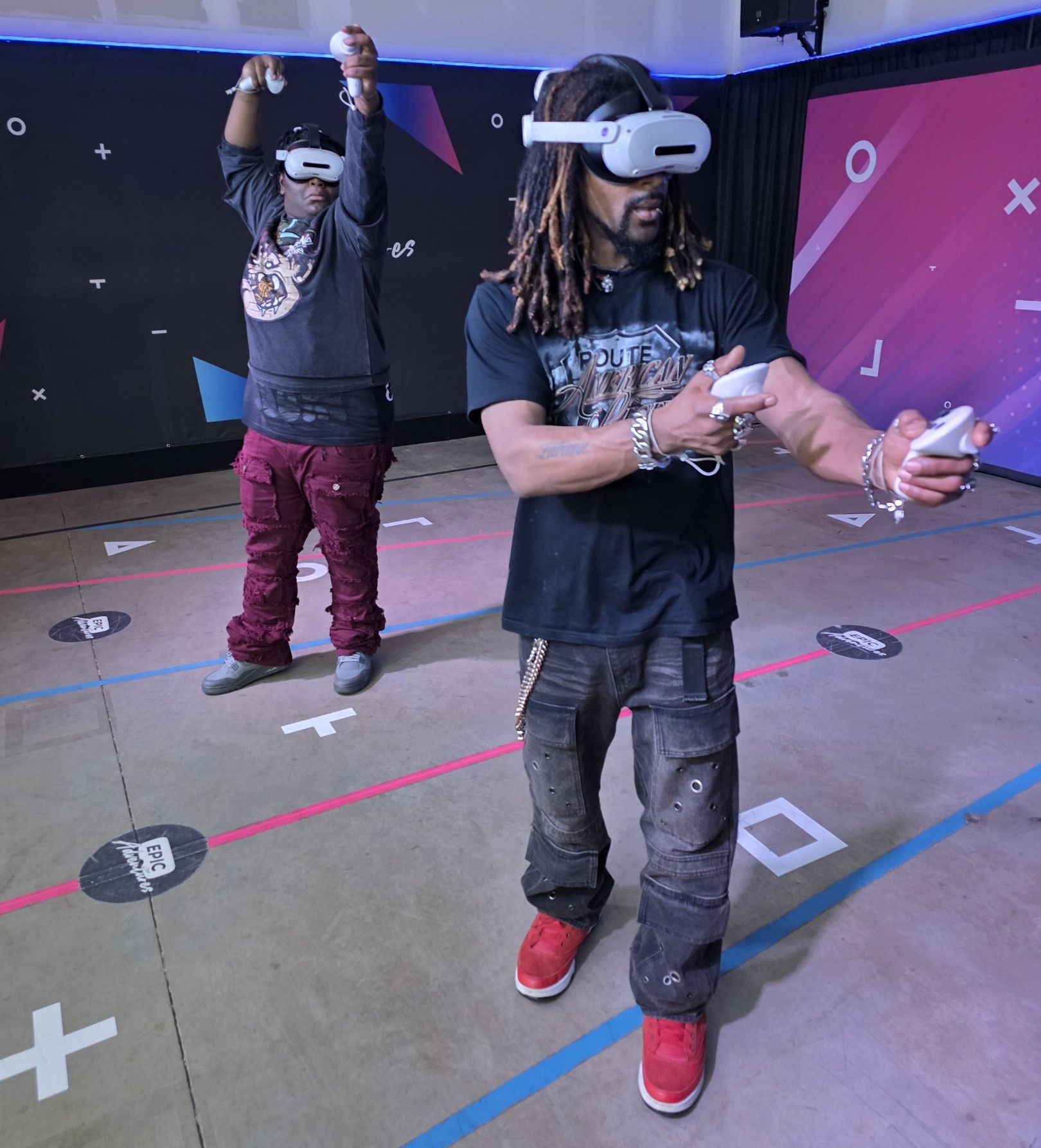 Two players immersed in a VR escape room adventure at Epic Adventures